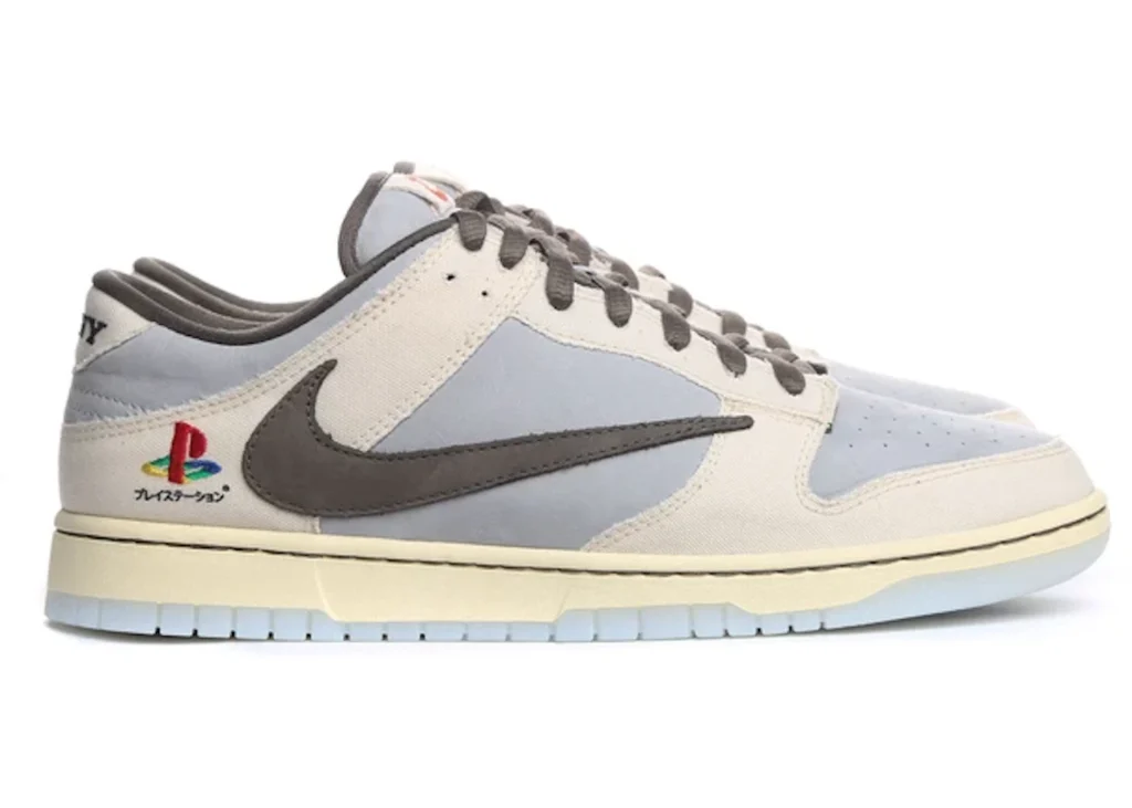 14. Dunk Low Travis Scott x PlayStation Parte de uma campanha da Sony para o PlayStation 5, o Dunk Low Travis Scott x PlayStation foi lançado via sorteio no site de Travis Scott. A quantidade de pares é um mistério, aumentando seu valor.