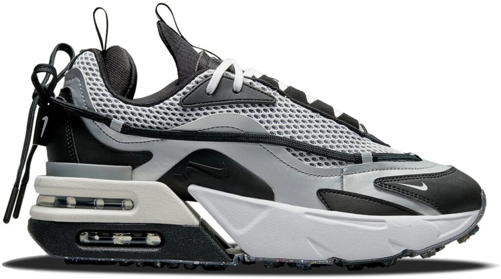 The Nike Air Max Furyosa Silver (W) is made with a grey mesh with metallic silver and black coatings. A stacked Air Sole unit and an alternative string loop system add the finishing touches to this experimental design.