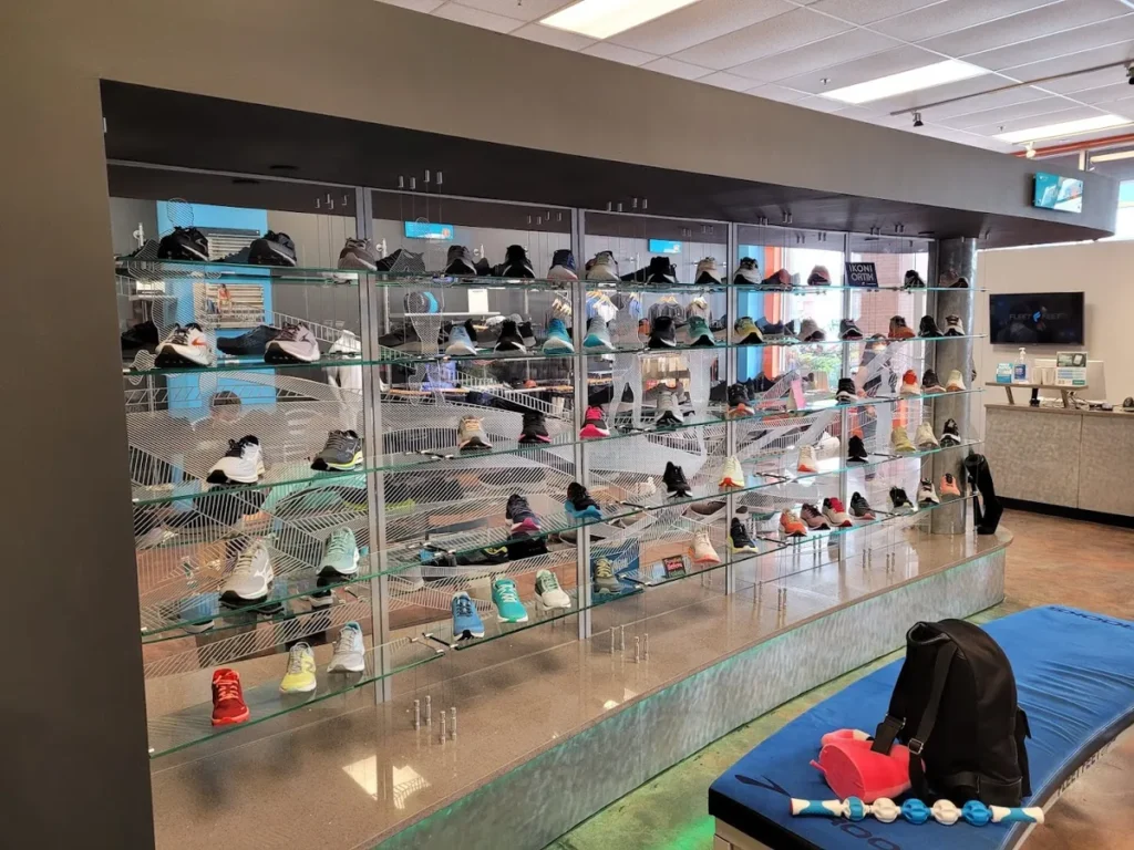 Shelves full of running and walking shoes