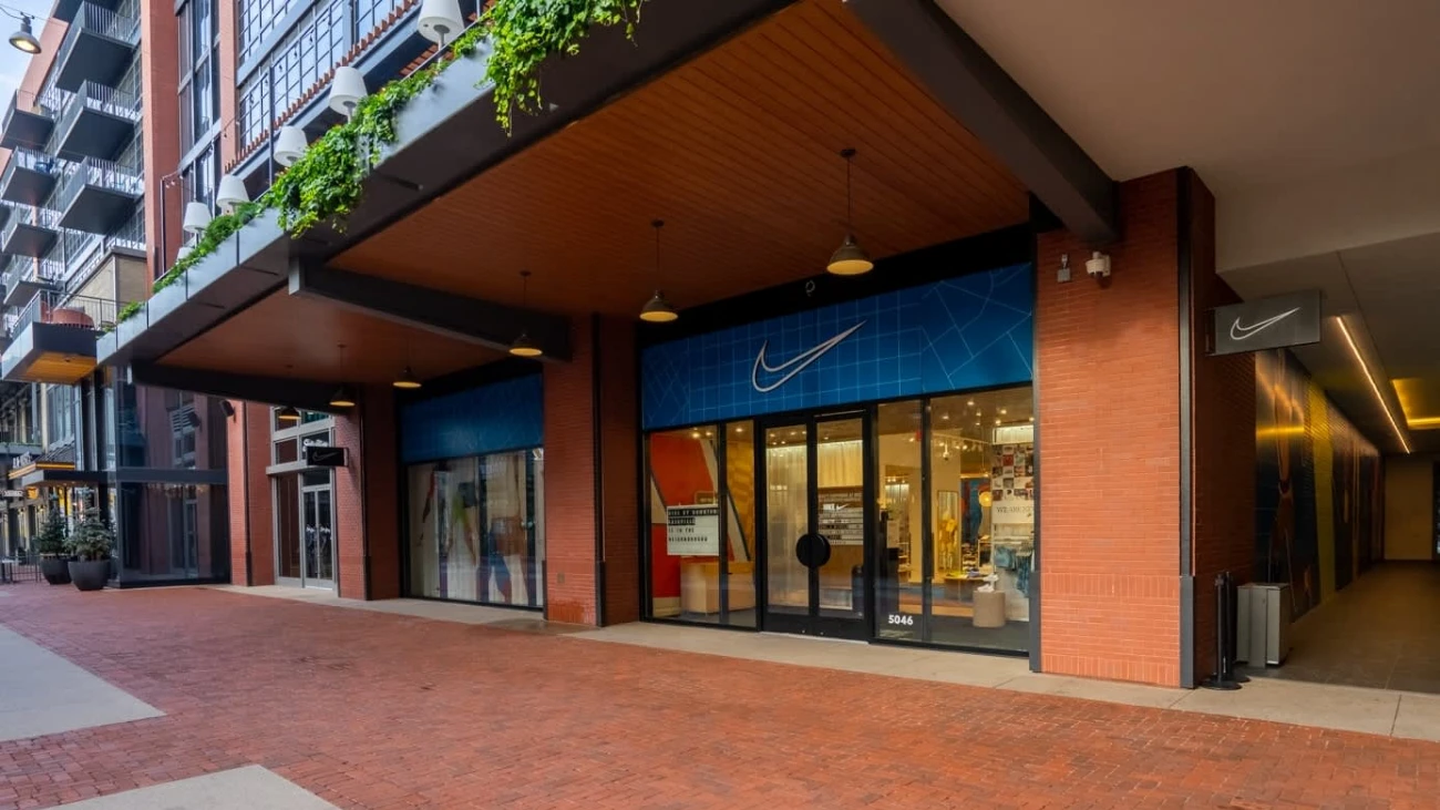 Nike storefront beneath a broad wooden canopy